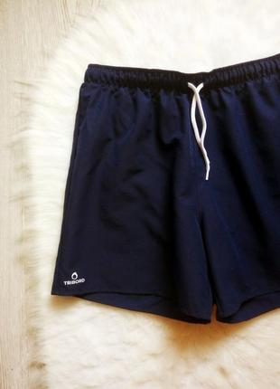 Синие темные короткие длинные мужские спортивные шорты с сеткой на резинке tribord2 фото