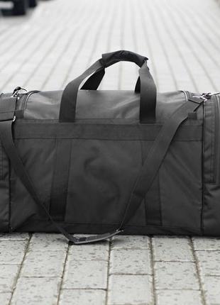 Чоловіча дорожня спортивна сумка пума puma чорна міцна міцна містка на 60 літрів2 фото