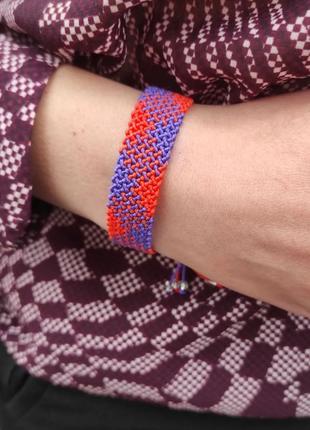 Жіночий браслет ручного плетіння макраме "мерет" charo daro (помаранчево-фіолетовий)1 фото