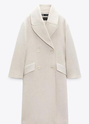 Zara пальто. молочне пальто в складі 70% lâna