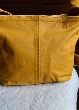 Unico кожаная  сумка на длинном ремне.6 фото