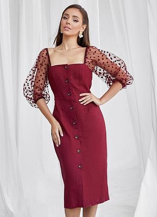 Силуетне плаття з лляної тканини з накладними кишенями на спідниці.