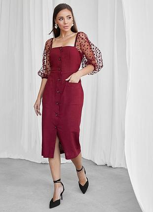 Силуетне плаття з лляної тканини з накладними кишенями на спідниці.