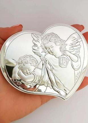 Срібний образ ікона ангел охоронець на білій дерев'яній основі 11смх9см в формі серця серце з ангелом