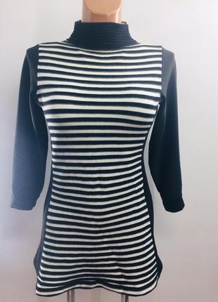 Стильная туника в полоску хорошо выделяет фигуру,очень хорошо тянется