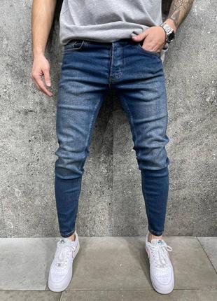 Чоловічі джинси завуженв темно-сині10 фото
