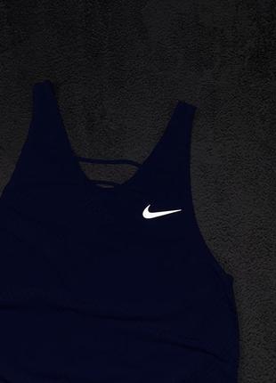 Спортивна жіноча майка nike7 фото