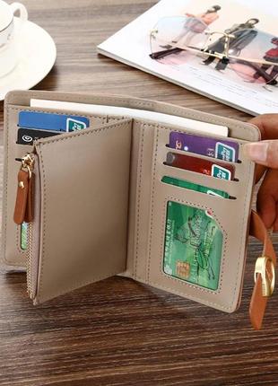 Компактний жіночий гаманець зі стильною застібкою4 фото