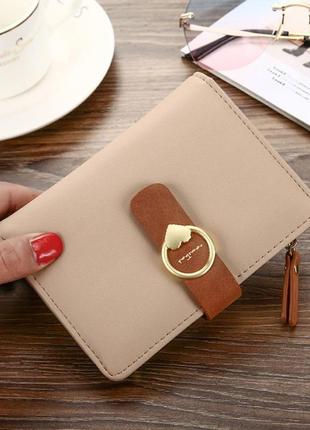 Компактний жіночий гаманець зі стильною застібкою