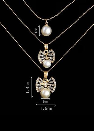 🏵шикарна потрійна підвіска на ланцюжках бантики, нова! арт.88922 фото