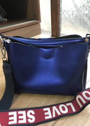 Новая кожаная сумка синего цвета