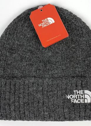 Зимняя шапка the north face, цвет серый с белым логотипом