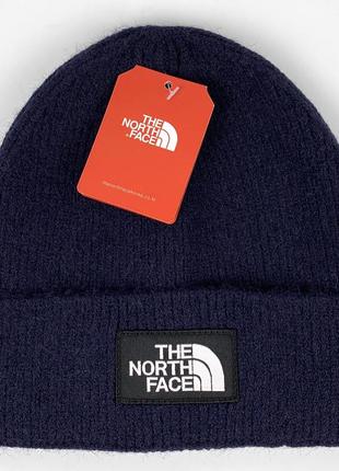 Зимова шапка the north face з чорним логотипом, колір темно-синій