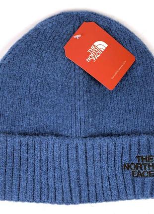 Зимняя шапка the north face, цвет бирюзовый с черным логотипом