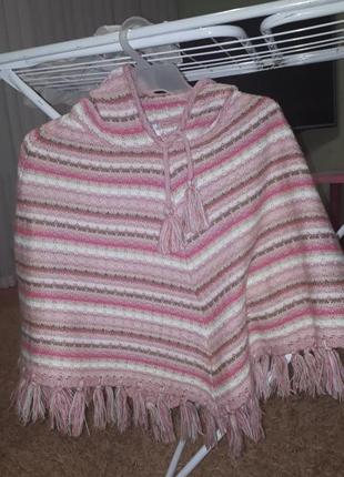 Пончо где то с 116 по 146 размер