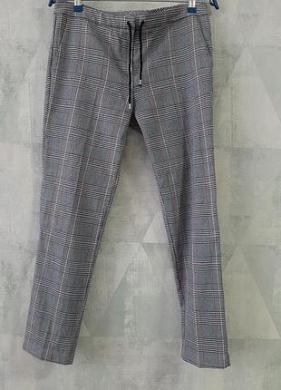 Брюки в клетку