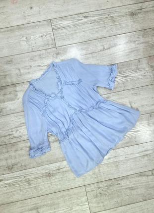Блуза нежно-голубого цвета с рюшами4 фото