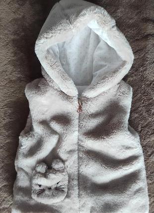 Тепла жилетка