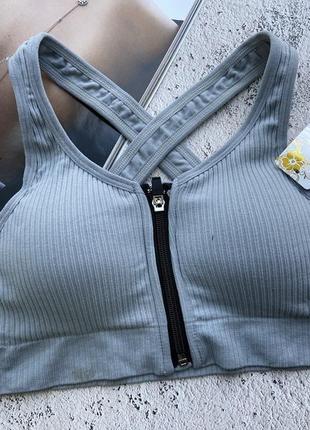 Спортивний жіночий топ із чашками на блискавці