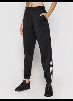 Спортивні оферсайз штани з лампасами adidas originals 3d trefoil track pants