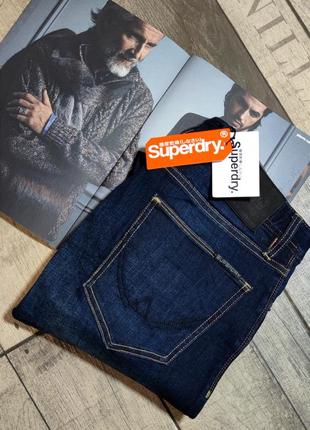 Мужские элегантные зауженные джинсы superdry синего цвета размер 312 фото