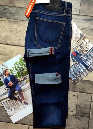 Мужские элегантные зауженные джинсы superdry синего цвета размер 314 фото