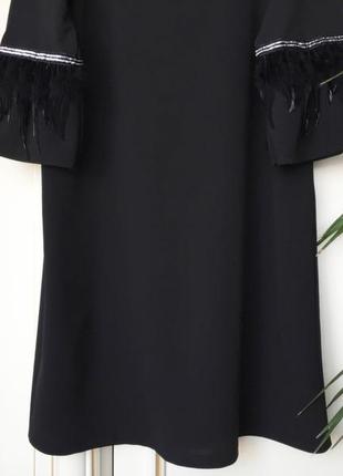 Сукні з пір'ям на рукавах італія m/l ошатне чорне3 фото