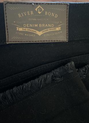 Чёрные джинсы с дырками5 фото