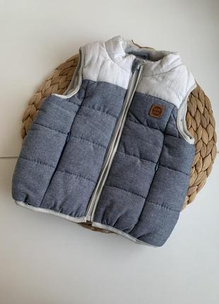 Жилетка, безрукавка