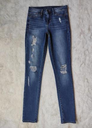 Синие голубые женские джинсы скинни стрейч американки узкачи с дырками низкая талия calvin klein2 фото