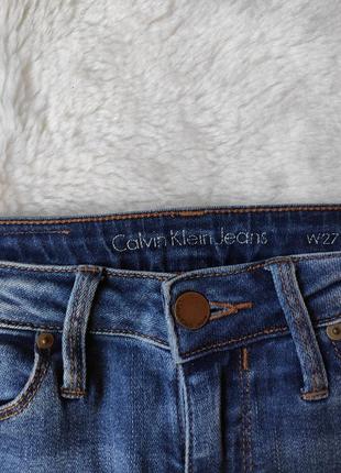 Синие голубые женские джинсы скинни стрейч американки узкачи с дырками низкая талия calvin klein6 фото