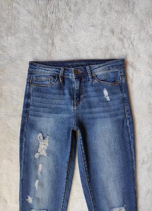 Синие голубые женские джинсы скинни стрейч американки узкачи с дырками низкая талия calvin klein4 фото