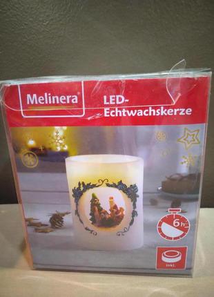 Воскова led свічка дід мороз з подарунками melinera1 фото
