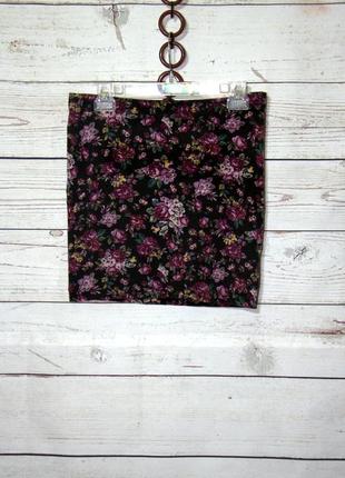 Трикотажная мини  юбка в цветочный принт2 фото