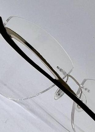 Жіночі коригуючі окуляри трикутні безоправні1 фото