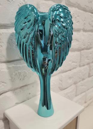 Гребінець "крила янгола"