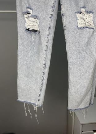 Світлі джинси з рваностями2 фото