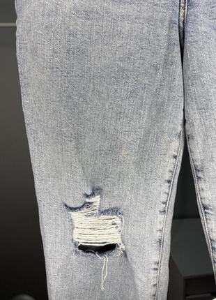 Світлі джинси з рваностями5 фото