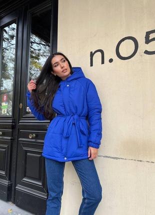 Куртка на поясі з капюшоном тепла жіноча оверсайз з кишенями бежева молочна чорна синя...