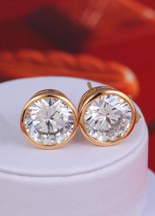 Серьги гвоздики   xuping jewelry  камень в ободке 12 мм золотистые