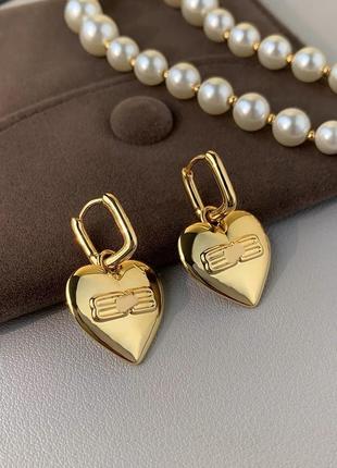 Сережки в стилі balenciaga
