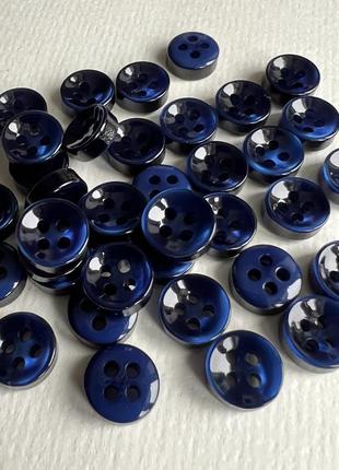 Пуговица рубашечная бортик  4отв синяя 10мм пластик