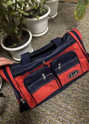 Дорожня сумка синьо-червона ручна клажа текстильна1 фото