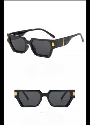 Стильні чорні окуляри з цікавими дужками1 фото