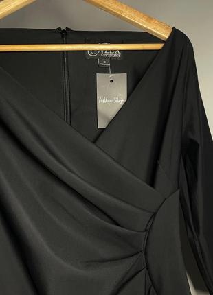 Брендова чорна сукня з приємної тканини .4 фото
