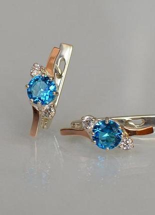 Срібні сережки з золотими вставками