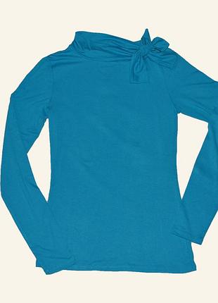 Блакитний гольф із зав'язкою на горловині від jbc