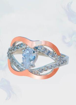 Кольцо из серебра с золотыми вставками