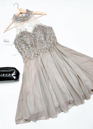 Нове жіноче плаття міді сірого кольору з декольте, яке вкрито камінцями і блискітками від бренду dress first