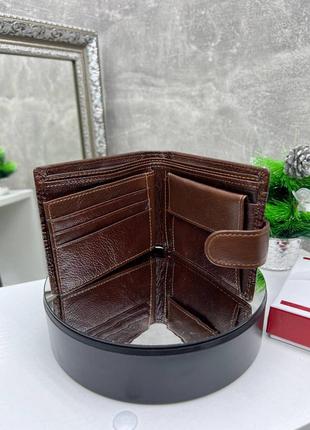 Стильний ефектний чоловічий гаманець у фірмовій коробці8 фото